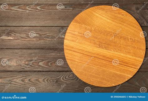 Cutting Board Over Towel on Wooden Kitchen Table. Stock Image - Image ...