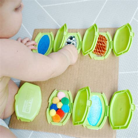 Peek-a-Boo Sensory Board — Baby Play Hacks | Baby sensory play, Baby ...