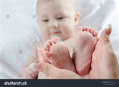 Baby Feet Mothers Hands Stock Photo (Edit Now) 286126133