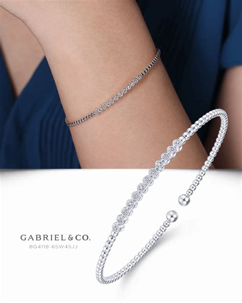 Crisp pave diamonds take center stage in this white gold bangle. BG4118-65W45JJ #GabrielNY # ...