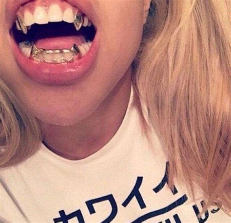 [SINGLE TOOTH] SILVER VAMPIRE FANG GRILL – Rhino Grillz