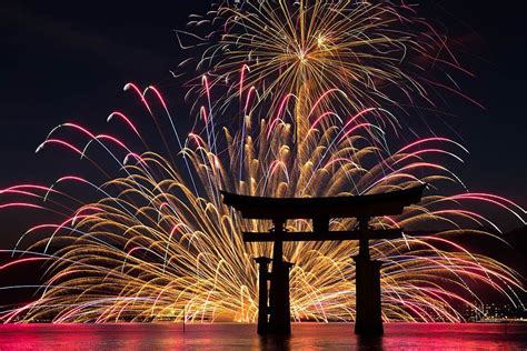 Visit Japan: The Miyajima Water Fireworks Festival is a stunning display of pyrotechnics set ...