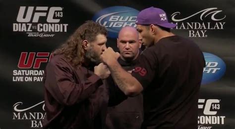 Nick Diaz vs Carlos Condit staredown pic from UFC 143 press conference ...