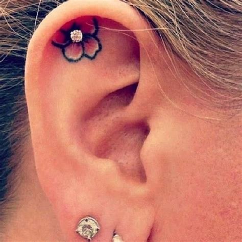 175+ Sensuous Inner and Behind The Ear Tattoos | Ear piercings, Unique ear piercings, Flower ...