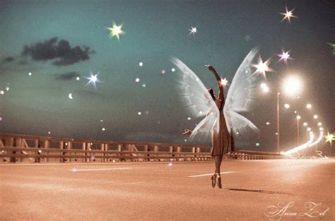 a woman dressed as a fairy standing in the middle of an empty parking lot at night