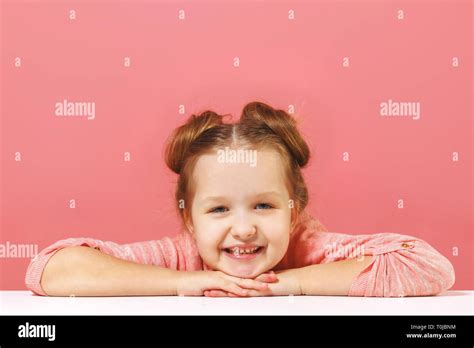 Baby girl arms up hi-res stock photography and images - Alamy