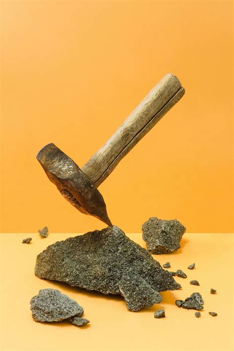 orange, wall, rock, stone, wooden, handle, indoors, still life, colored background, hand tool ...