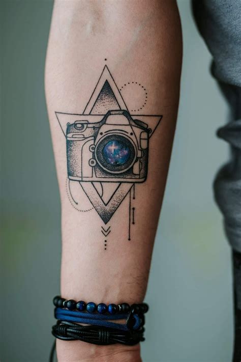 Tattoo photographer | Camera tattoos, Camera tattoo design, Camera tattoo small