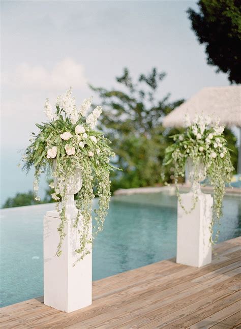 Tropical Green + White Wedding Wonderland | Wedding alter flowers, Floral wedding decorations ...