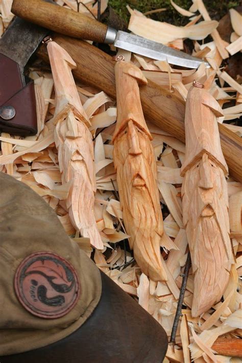 an assortment of wood shavings and tools on the ground