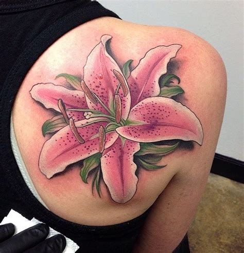 Realistic pink lily on back tattoo - 55 Awesome Lily Tattoo Designs