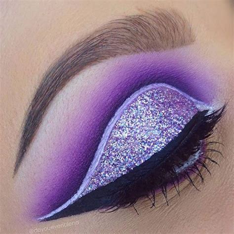 All purple everything @doyouevenblend Loving this cut crease & graphic liner Look executed with ...