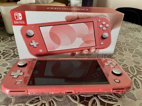 Nintendo switch lite (coral), Video Gaming, Video Game Consoles ...