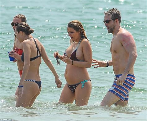 Pregnant Blake Lively shows off baby bump in a bikini at Taylor Swift's ...