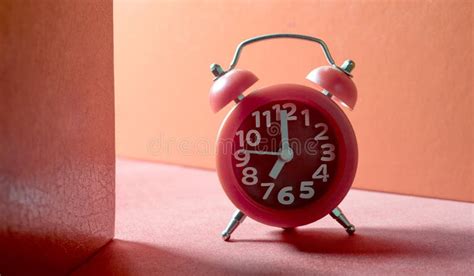 Red Analog Alarm Clock on Red Ground Stock Photo - Image of schedule, clock: 190827892