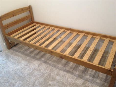 This is a small single bed frame. Takes a 75 x 190 cm mattress, which is narrower than a full ...