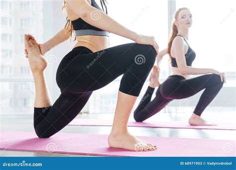 Two Women Stretching Barefoot Pink Yoga Mat Stock Photos - Free ...