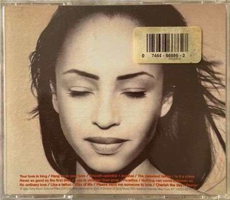 an album cover with a woman's face and barcode on the back of it