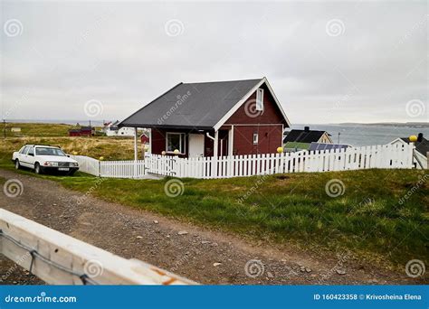 Varde, Norway - June 23, 2019: Calm Landscape with Water and Fishing Village on the Bank of a ...