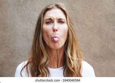 Multicultural Middle Aged Woman Sticking Her Stock Photo 1840040584 | Shutterstock
