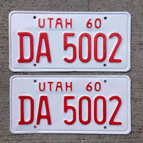 1960 Utah license plate pair DA 5002 YOM DMV clear Chevy