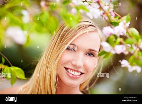 Garden cherry blossom tree woman hi-res stock photography and images - Alamy