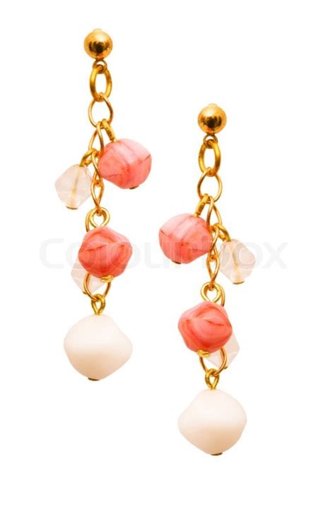 Pair of earrings isolated on the white ... | Stock image | Colourbox