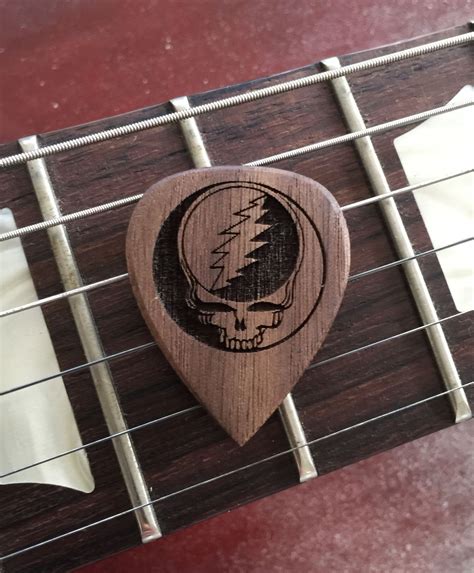 Check out this custom guitar pick we recently hand made for a customer. Visit laserpickusa.com ...