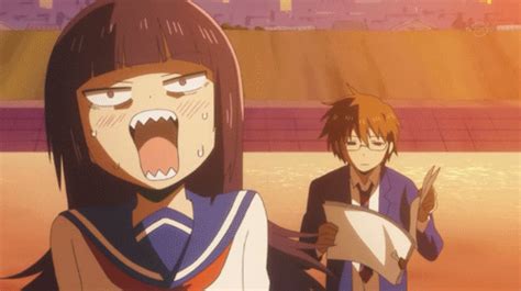 two anime characters with their mouths open in front of the camera, one holding a paper