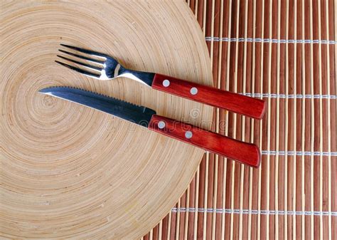 Wooden Round Dish and Red Cutlery Stock Photo - Image of food, enjoy ...