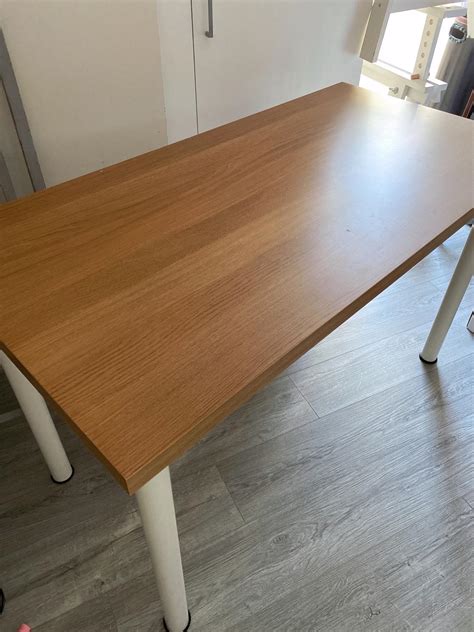 IKEA Linnmon table top 120 x 60 cm with legs in E8 Hackney for £25.00 for sale | Shpock