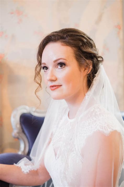 Bride in fron too our ripped vintage wallpaper wall on our midnight blue and silver rococo chair ...