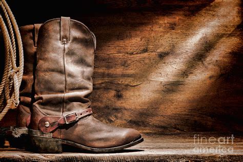 Cowboy Boots on Wood Floor Photograph by Olivier Le Queinec