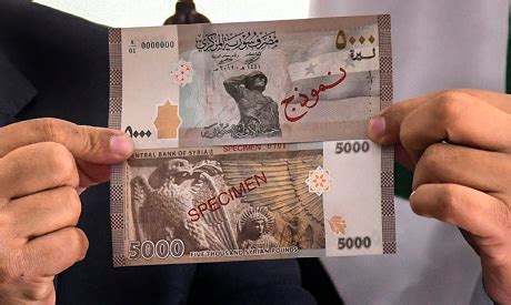 Syrian pound hits new low in contagion from neighboring Lebanon's ...