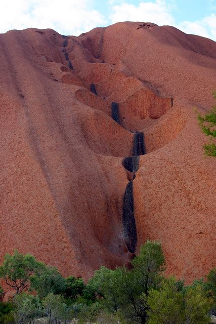 Uluru Erosion | During the rains, water cascades down this e… | Flickr