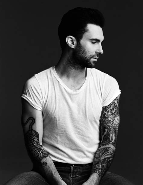 Adam Levine Tiger Tattoo In His RIght Arm