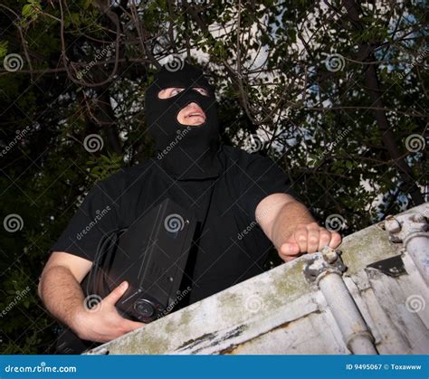 Thief in a mask stock image. Image of caucasian, evil - 9495067