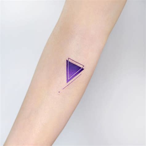 Cover-up purple triangle by tattooist Ida - Tattoogrid.net