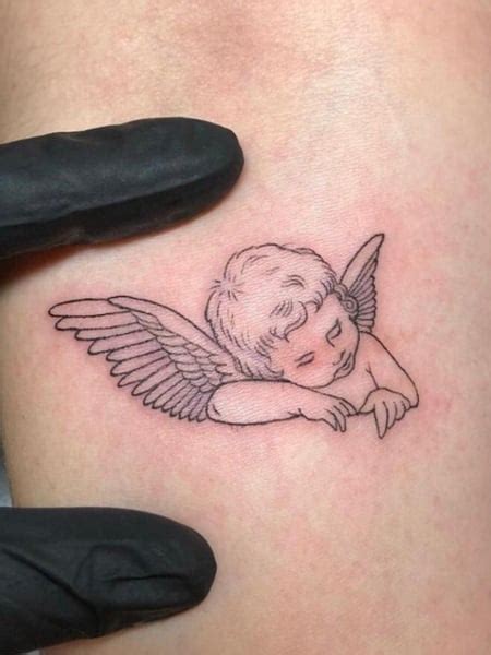 Sleeping Angel Tattoo Designs