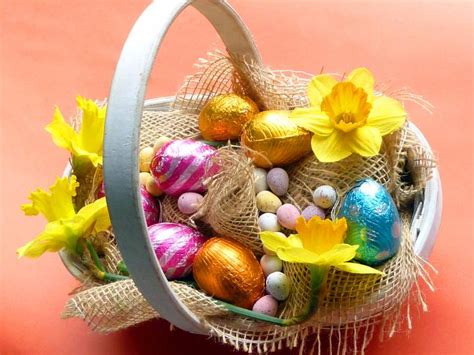 Easter basket with chocolate eggs and flowers Creative Commons Stock Image