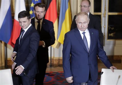 Politeness prevails as Putin and Zelensky hold inaugural meeting | The Independent | The Independent