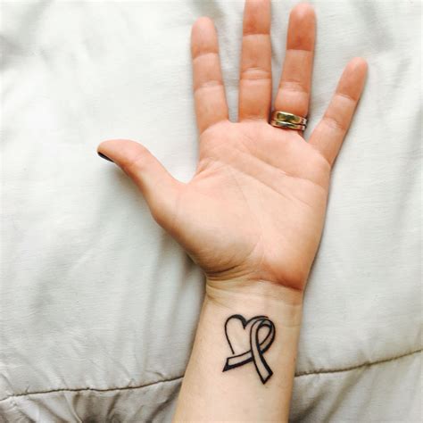 Update more than 70 cancer ribbon heart tattoo best - in.cdgdbentre