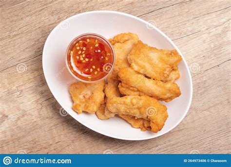 Fried Chicken Nuggets with Dipping Sauce in White Plate Stock Photo ...