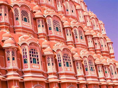 The intricate design of the five-story Hawa Mahal, or Palace of the Winds, in Jaipur was meant ...
