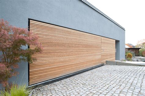 The Discrete Charm of Hidden Qualities | STYLEPARK | Garage doors, Garage door design, Garage design