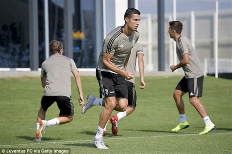 Cristiano Ronaldo struts his stuff during Juventus training as he targets first Serie A goal ...