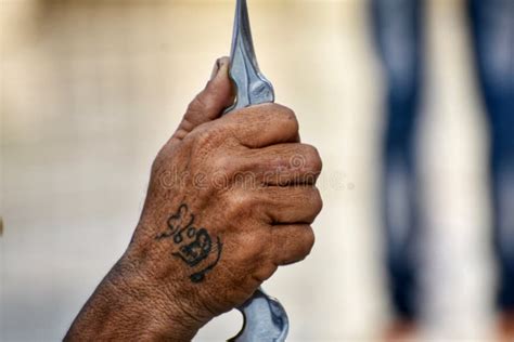 Punjabi Sikh Tattoos on Her Hand Stock Photos Stock Photo - Image of ...