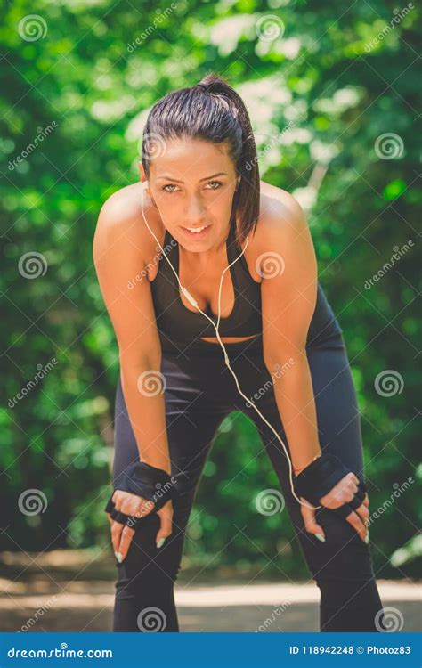 Portrait of Woman Resting with Hands on Knees in the Park. Stock Photo - Image of healthy ...