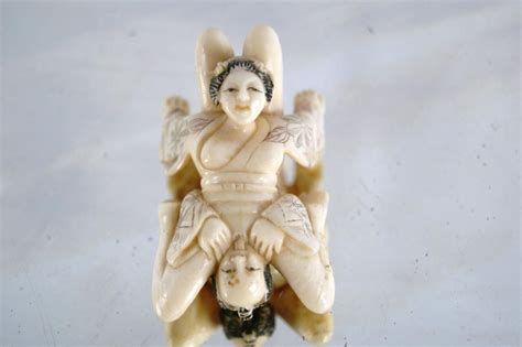 Shunga Netsuke carvings walnut & ivory - 2 pcs