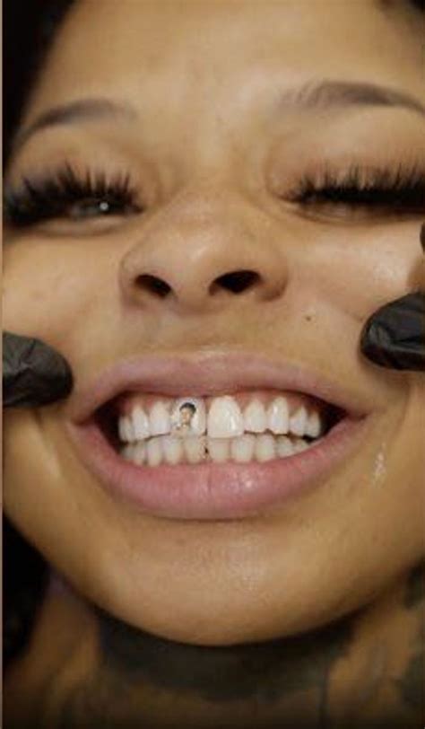 Watch Chrisean Rock Get Blueface Face Tattooed on Her Tooth ...